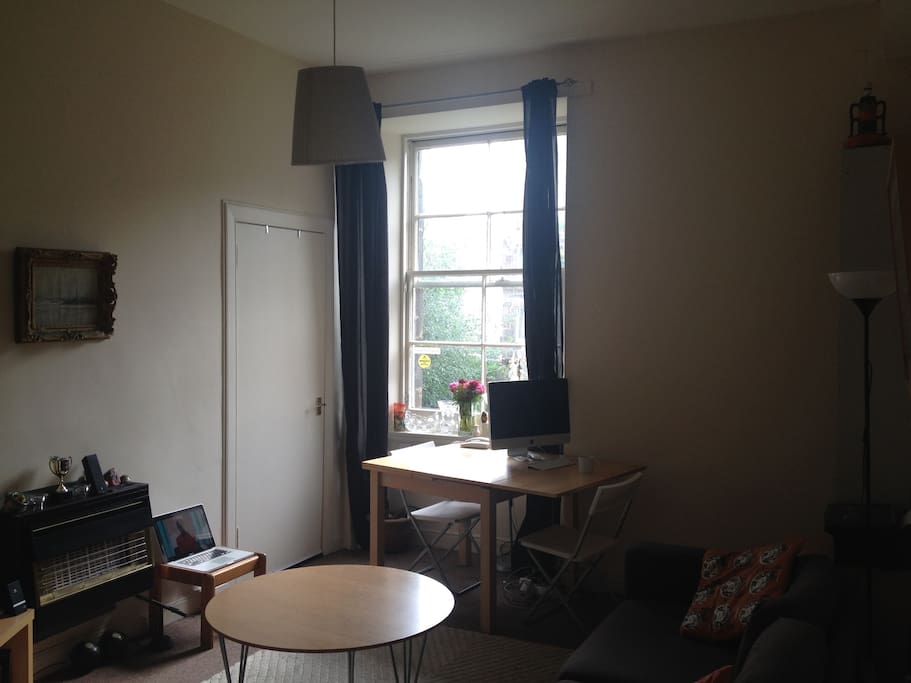 Living space with view out to shared back garden