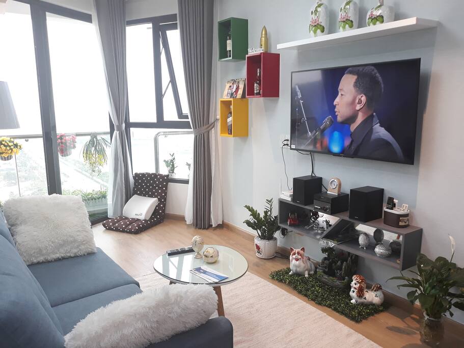 Modern and full furnished living room with smart TV