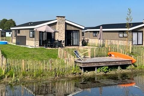 Vacation chalet with jetty in the vacation park