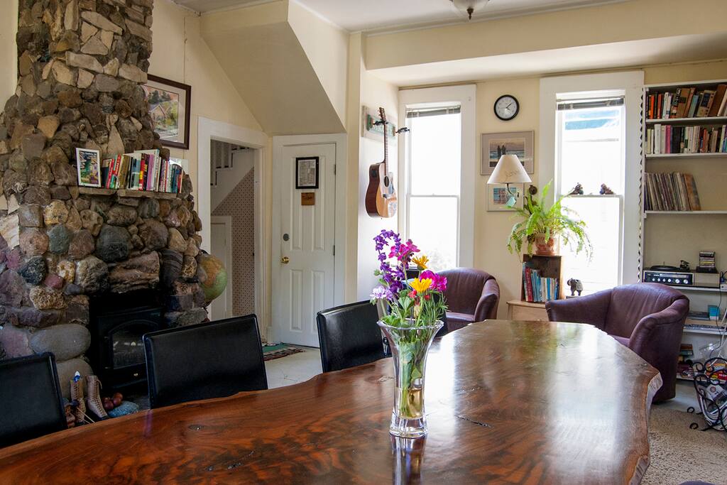The focal point of the Bridge Street Inn lounge is this one of kind table created by a redwood tree and Carl.