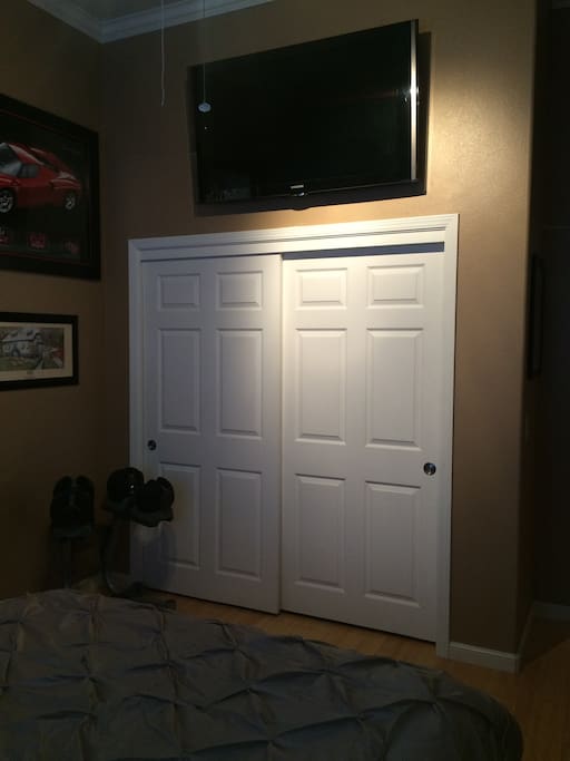 Closet access with hangers. Wall mounted flat screen tv with dvd player and Direct TV access.