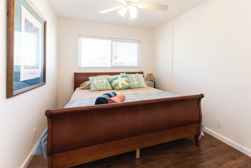 Master bedroom with lots of light and King bed