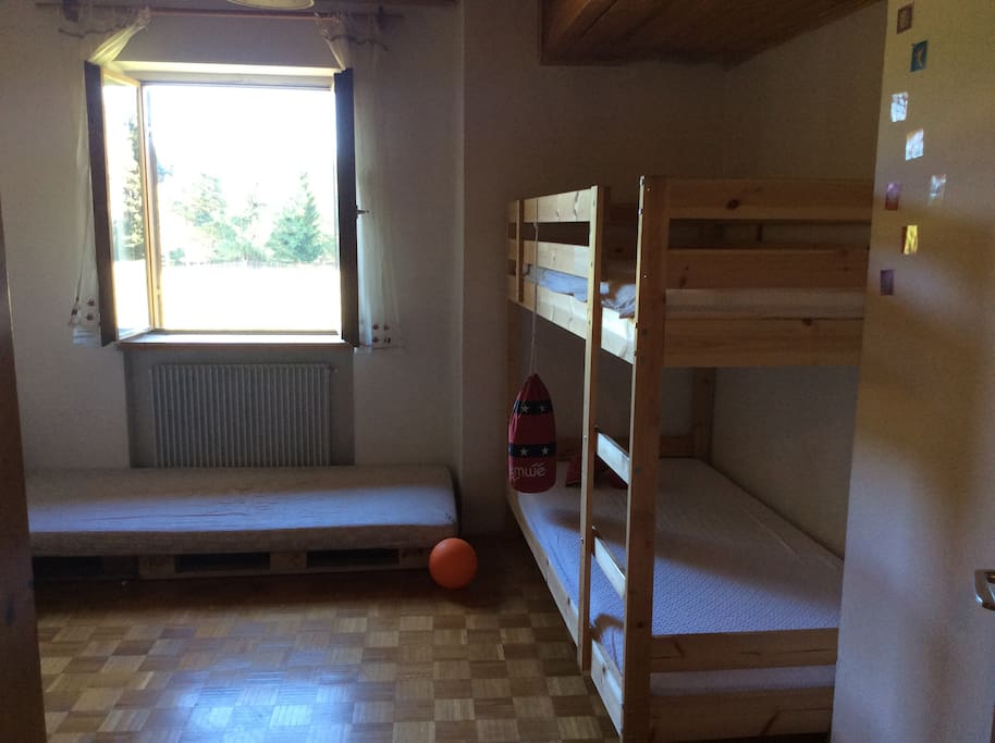 Camera con tre posti letto