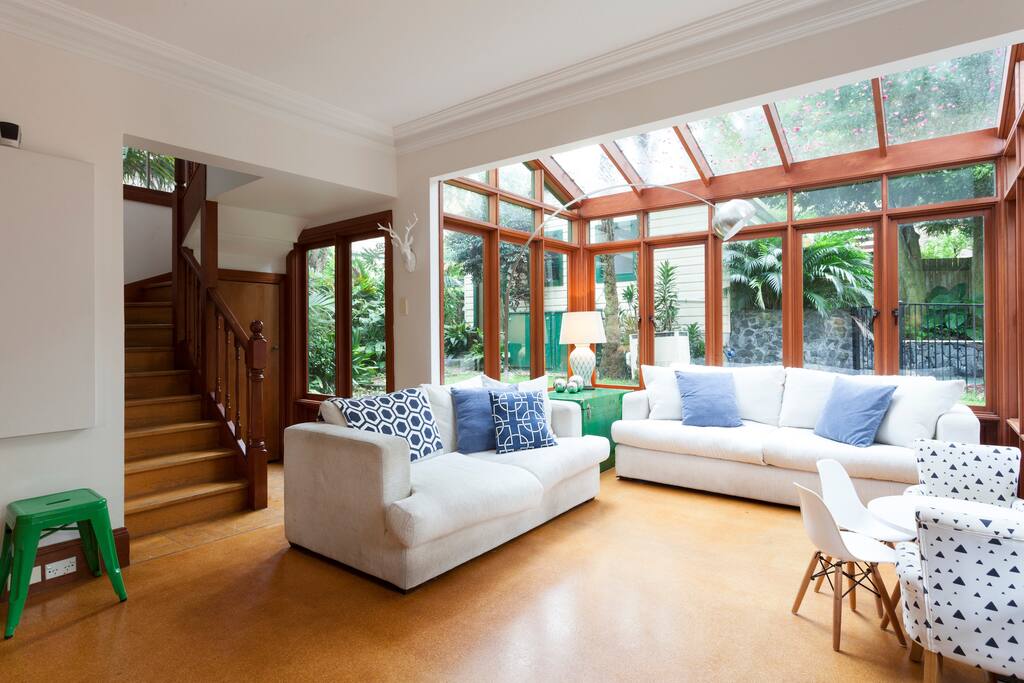Spacious & open kitchen living area with view of pool, gardens and doors opening onto the verandah. Overlooks outdoor entertaining area which seats 8