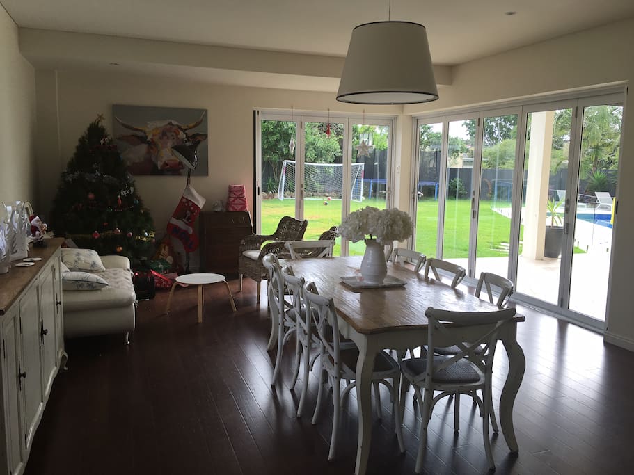 Dining room overlooking pool and garden