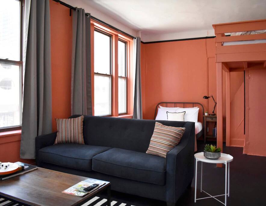 Bold walls highlight just how much light this space gets (and provide a very flattering selfie backdrop)