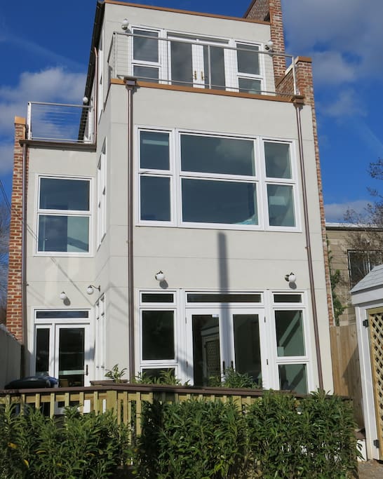 Back of the house. It is these great windows that bring so much light into the space.