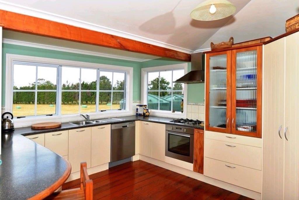 The kitchen, overlooking the paddock where cows, sheep and or horses graze