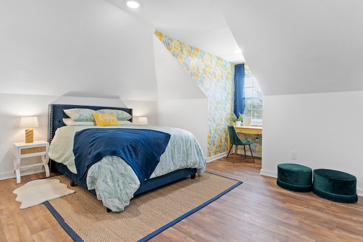 Upstairs is the third bedroom, named June (June Carter Cash) and sleeps 2. It has a walk-in closet with a fan for hot sleepers! The desk is a great place to work or put on makeup in the mornings. Super soft bedding, too.