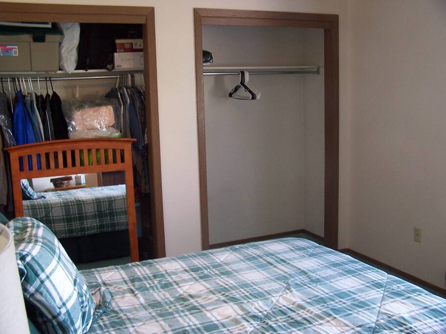 Guest bedroom with double bed, one closet open (full closet is storage, I won't need in it!).