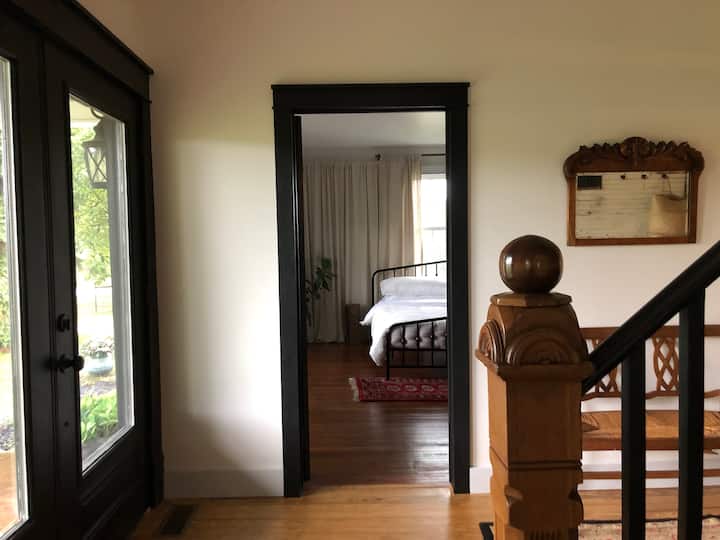 Front entrance with a view of the Master Bedroom with a private bathroom with bathtub.