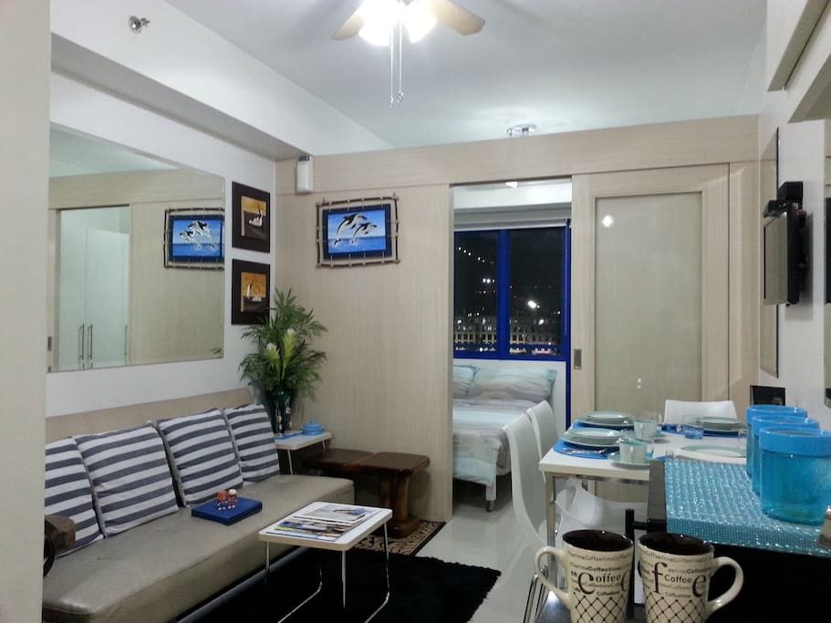 Condo: aqua blue and brown/black shades