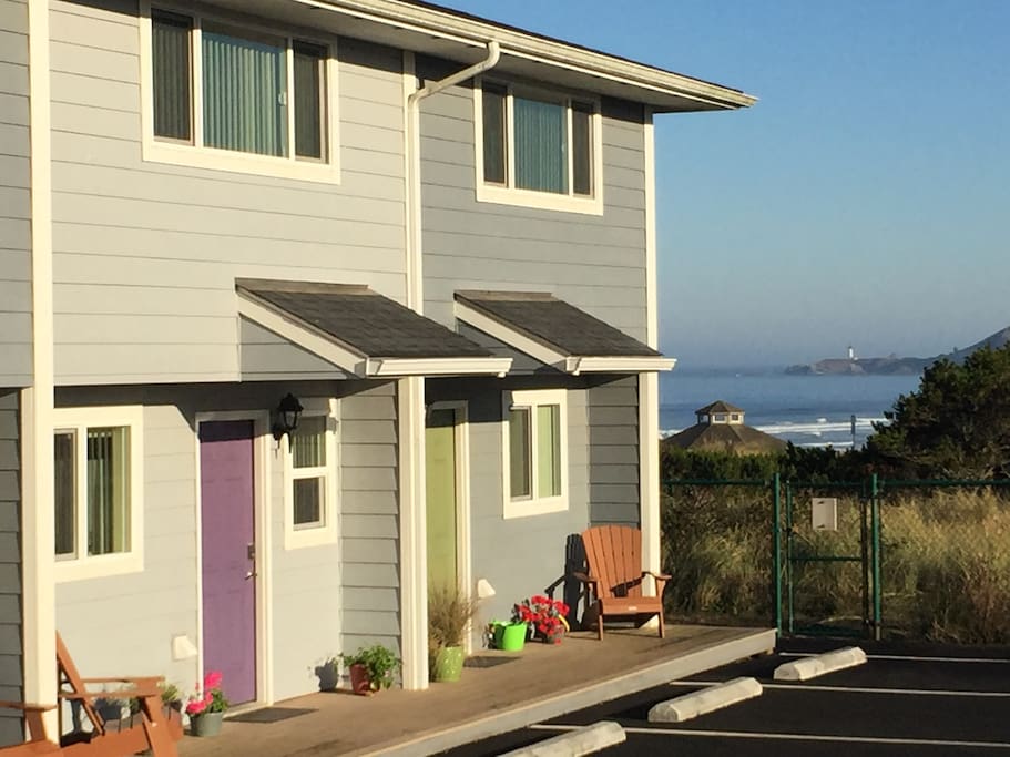 Nye Beach Townhomes with Don Davis Park Beach access and Yaquina Lighthouse in the background just 1 block away!