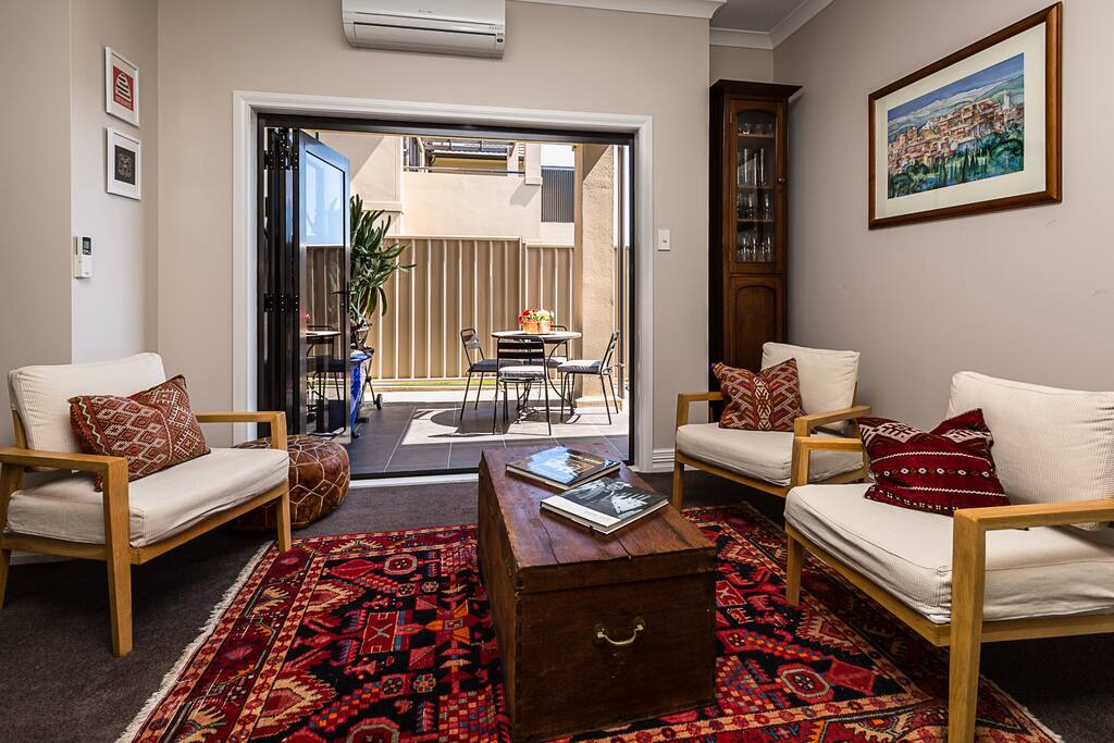 Sunny, warm light filled self contained accommodation for up to 4 people. 2 bedrooms, opens into garden on two sides.