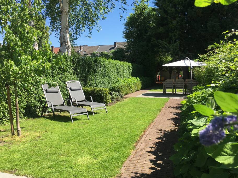 Big garden (30x6m) with lots of sun, a separate dining terrace and small playground for the kids.