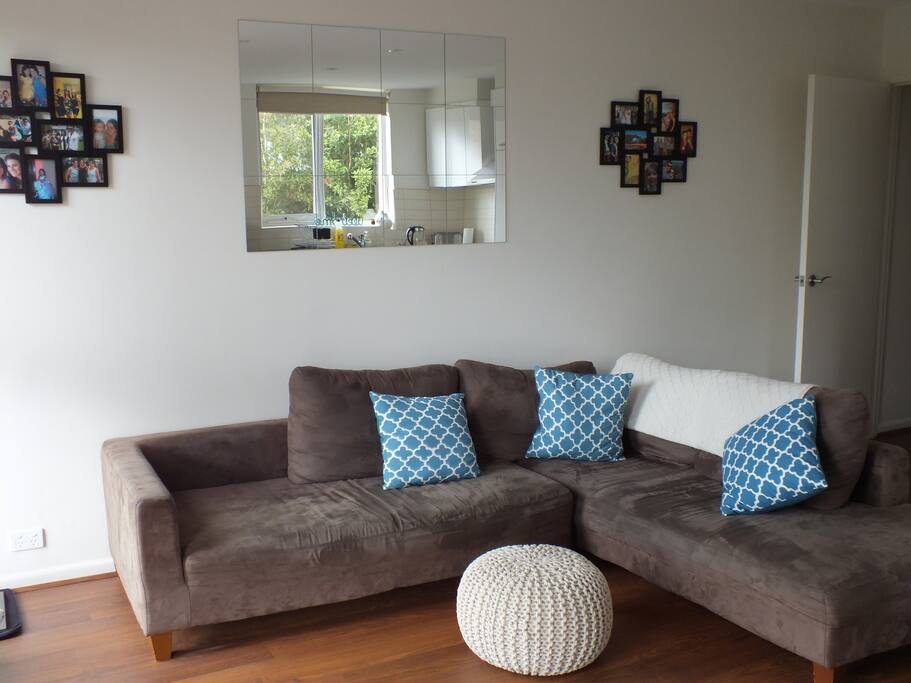 Large L-shaped couch in the lounge area