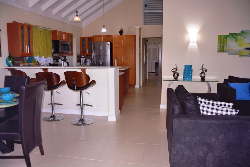 Entrance reveals Living Area, Dining Area, Kitchen and hallway to 3 Bedrooms.