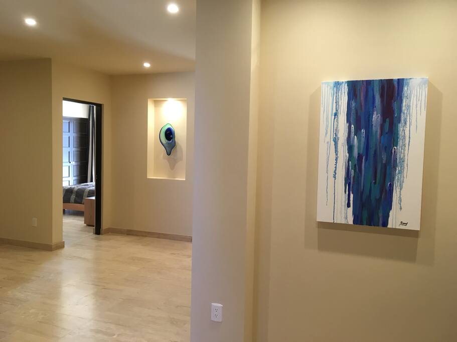 Entry area with access to the 2nd level, two bedrooms, laundry facilities and garage. Area also has access to half bath and guess bathroom from hall. Area to the right can accommodate a air mattress.