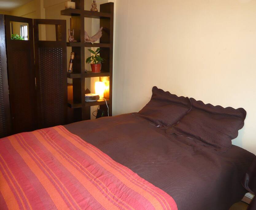 Queen Size Bed -- can be separated to Two Single Beds by request