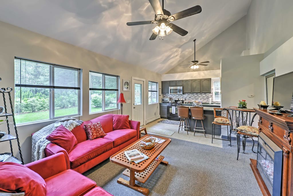 Vaulted ceilings and modern appliances greet you upon entering the home.