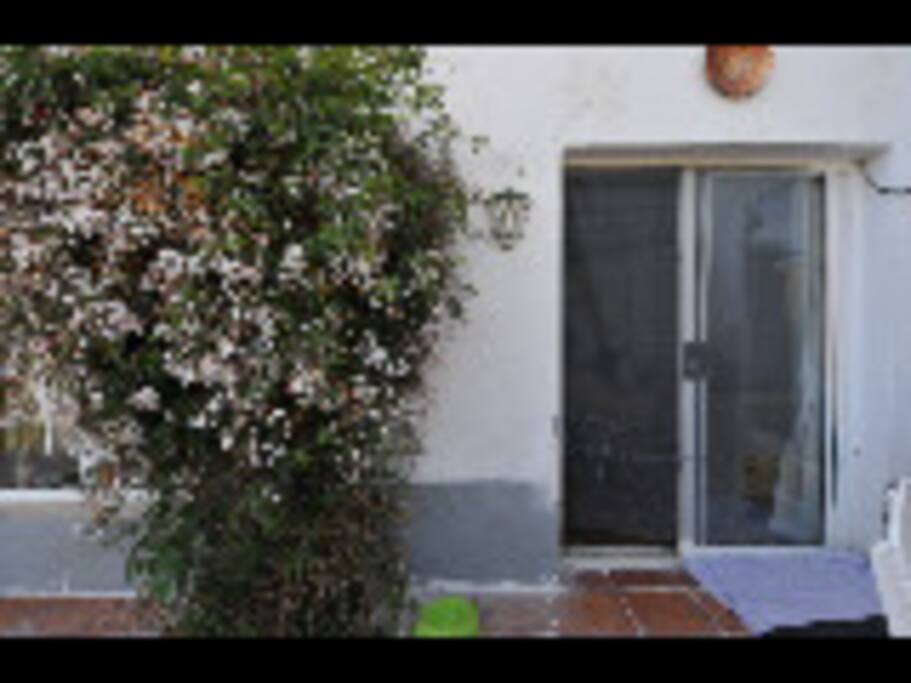 Double sliding door access to the Lower Apartment