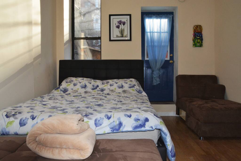 Blue door goes to outdoor patio / backyard.