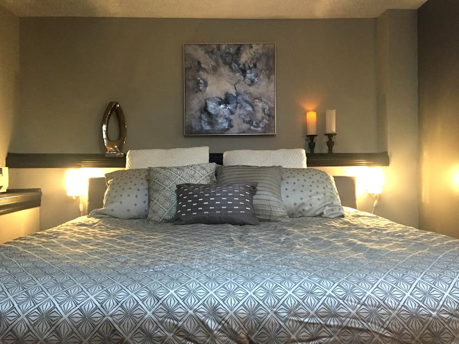 King bed with hotel mattress and premium bedding.