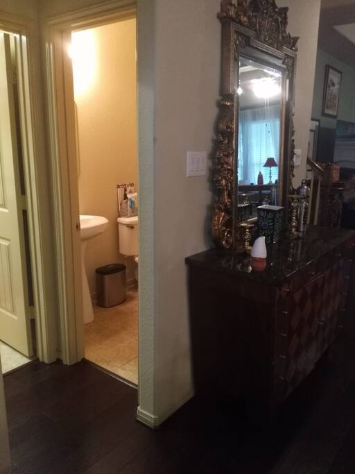 Left: Laundry Room & 1/2 Bath, Right: Dining Room & Kitchen