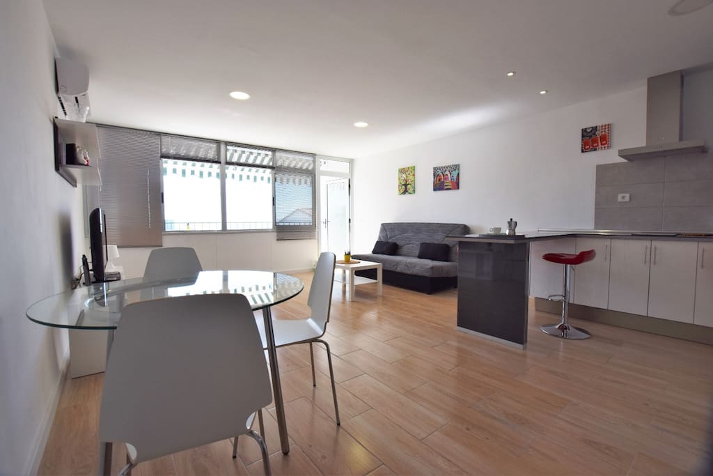 Open space of sitting room and kitchen