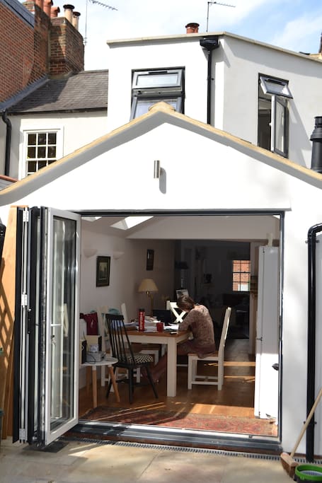 Large bi-fold doors bring the outside in