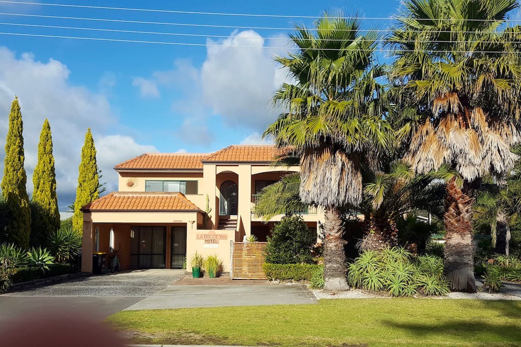 Main Building from Road. Your unit is located down the driveway in a private courtyard.