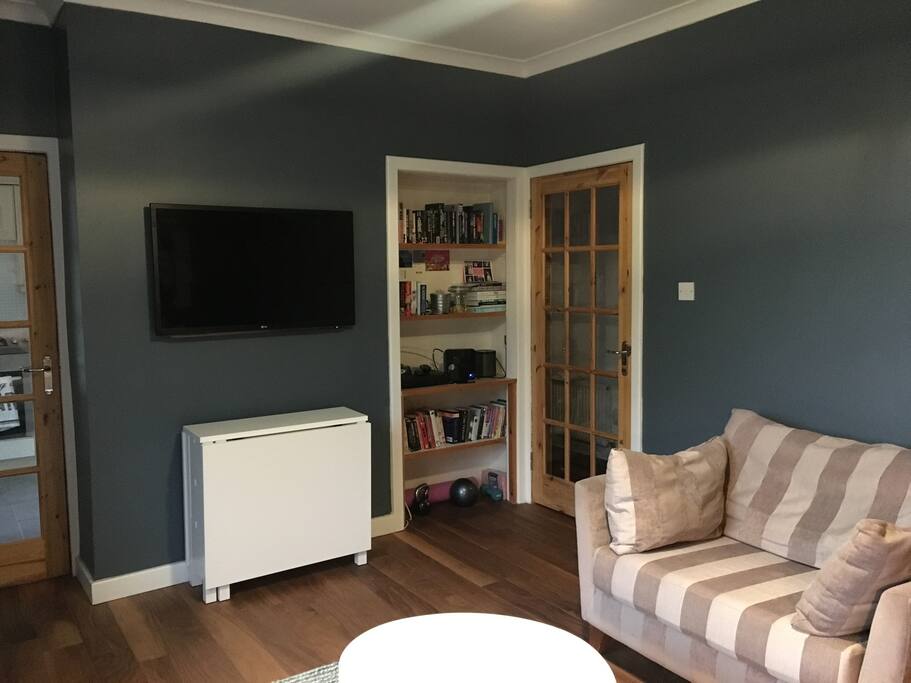 Living room with Virgin Media and 42" TV