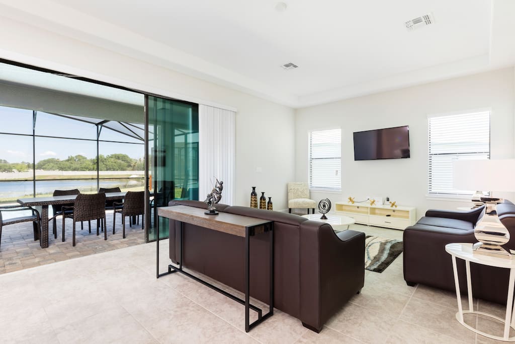 Relax in the cozy and spacious living room or on the patio!