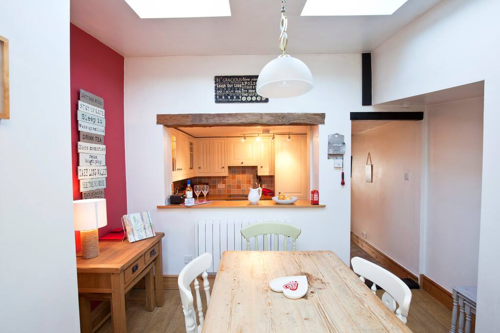 Large dining room with galley kitchen