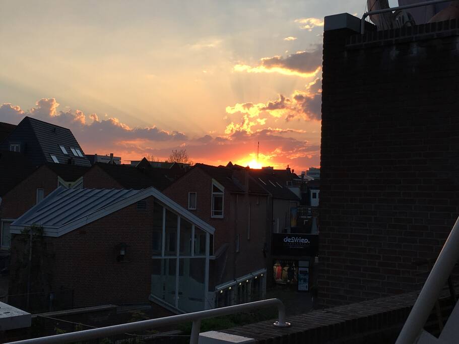 Ondergaande zon vanaf balkon