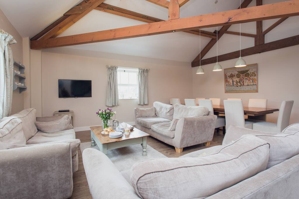 The Lounge with sofas and dining for 10 guests. Stunning views out of both windows.
