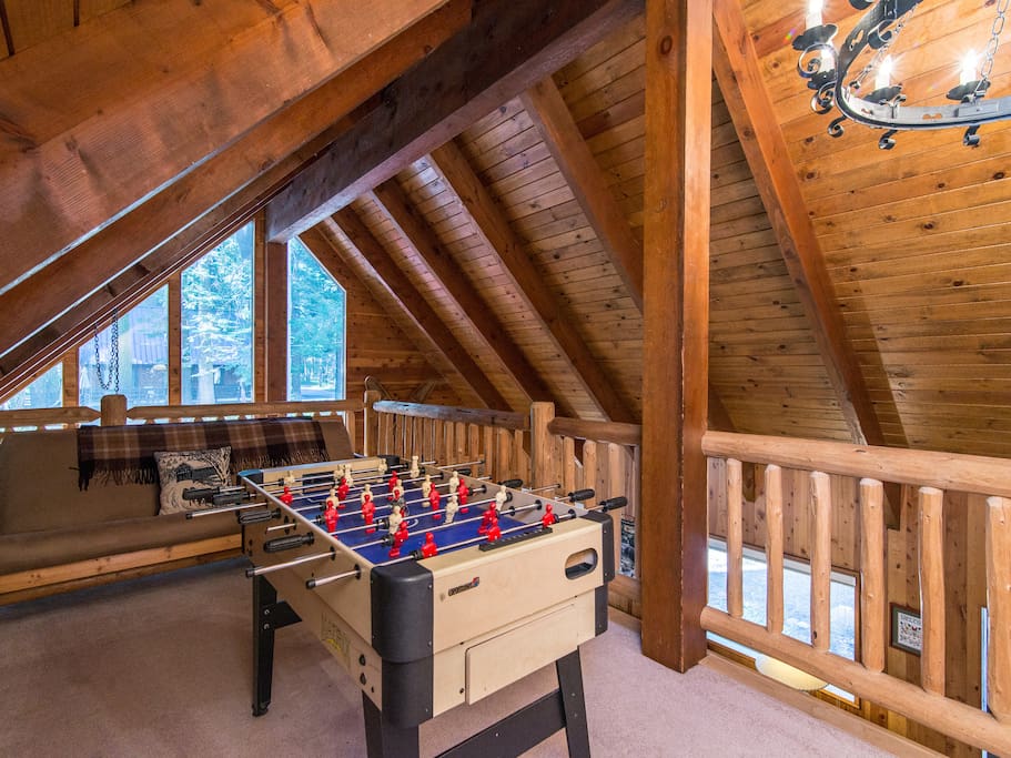 Challenge the group to a friendly foosball tournament in the loft, where a futon sleeps 2.