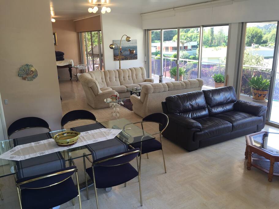 LIVING SPACE with glass doors leading to BALCONY