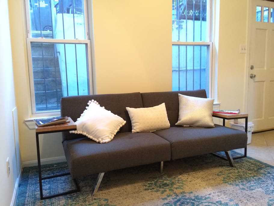 Couch folds down into a pull-out.
