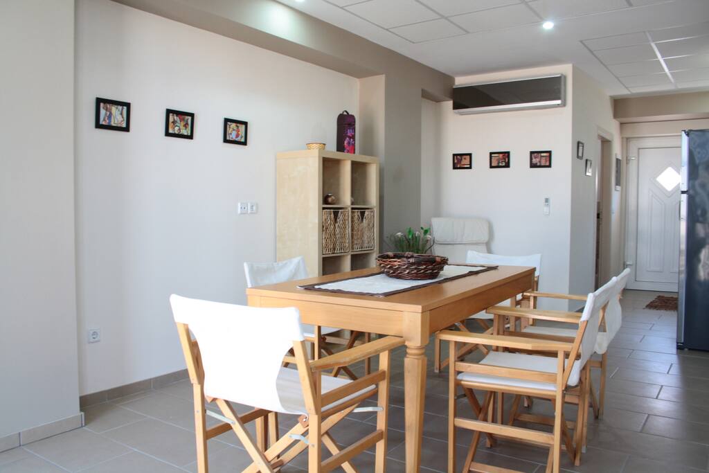 Six seater dining area with adjacent laundry facilities