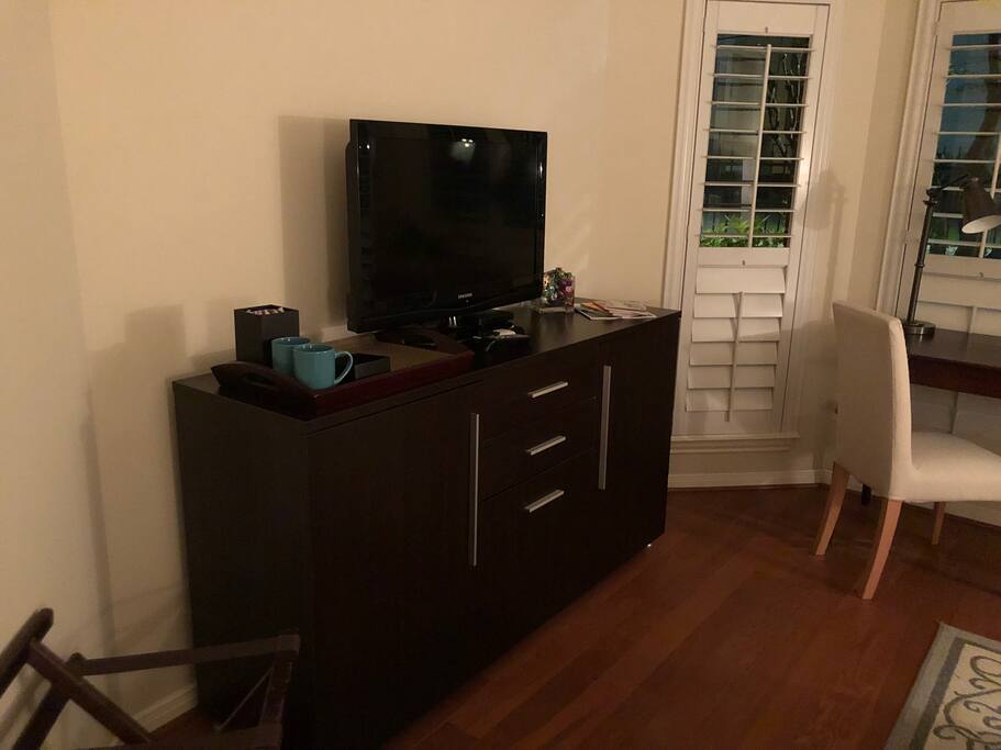 TV, Directv, refrigerator & coffee maker.