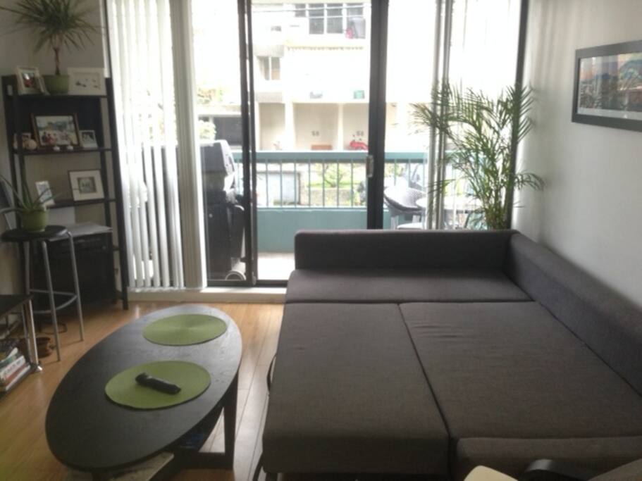 Once the couch is pulled out (don't worry- it comes with linen and pillows)