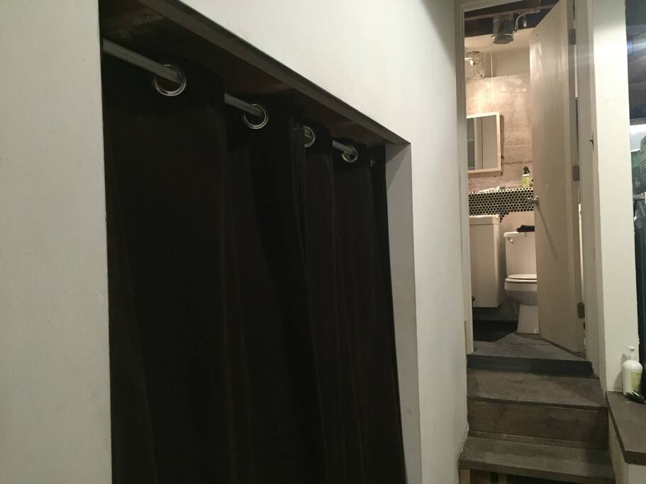 On the left there is a nook with a second bed for extra guests.