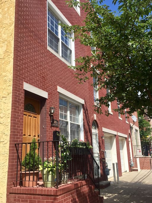 This three story house has 2,500 square feet, 4 bedrooms, and parking for 2 cars in the back of the house (accessed through an alley)