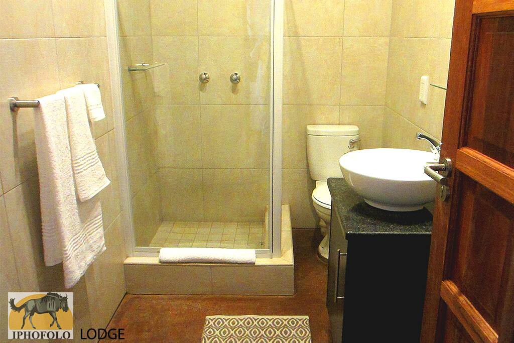 private bathroom with shower