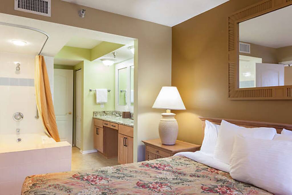 Master suite with large bath tub.