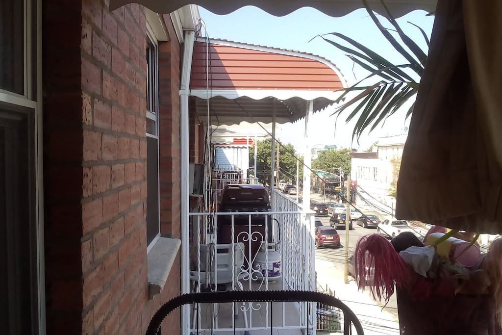 View from balcony off of living room, near red and white