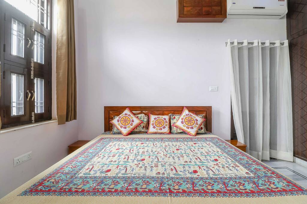 Air conditioned double bed room with balcony and private washroom.