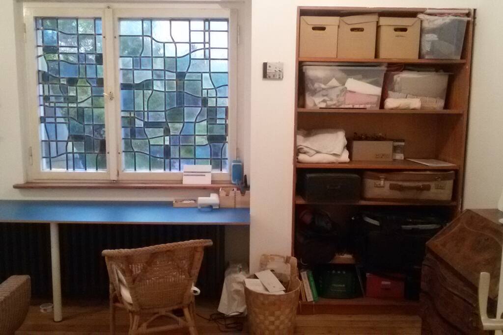 table and fancy window with look in the garden