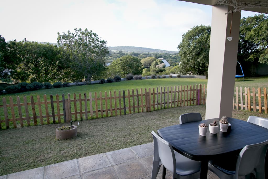 Stunning patio with the most amazing view. It's quiet and private and includes a table for you to sit and enjoy your meals, sundowners etc. It also has a braai, if you'd like to cook your food, the South African way ;)